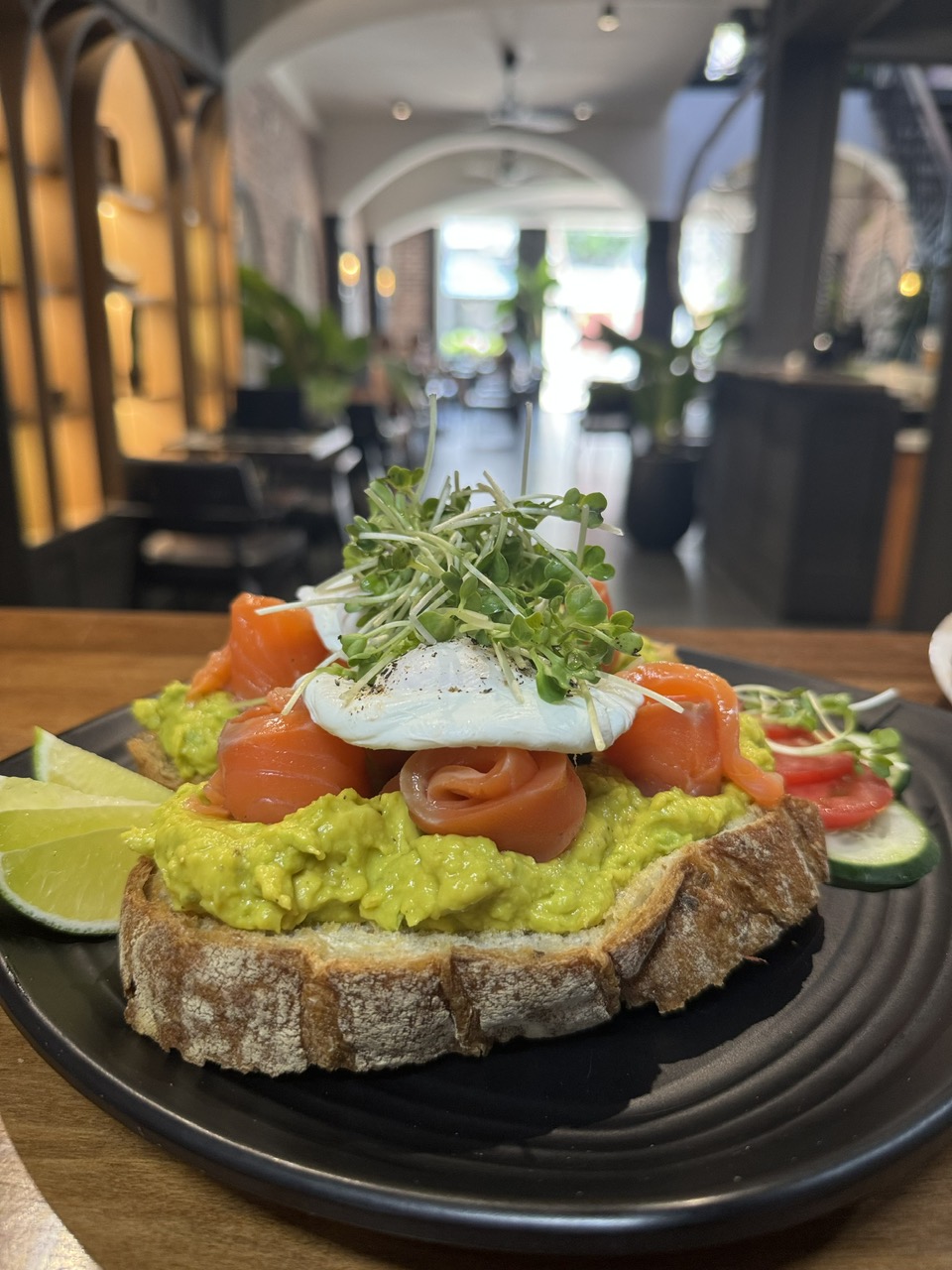 Fresh organic breakfast and brunch dishes at Café Culture Nha Trang - eggs benedict, avocado toast, pancakes